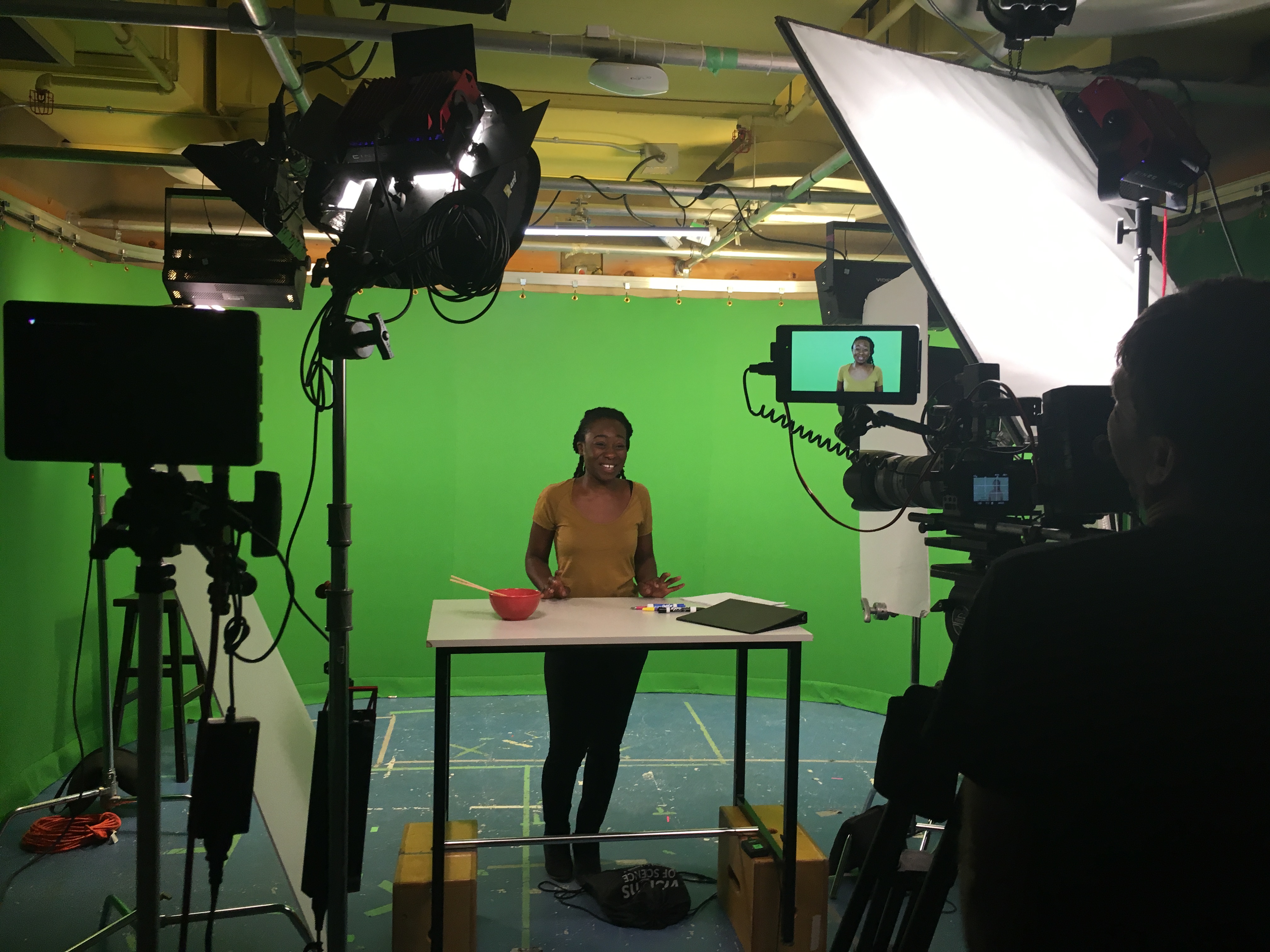 Dr. Eugenia Addy on set during a broadcast production
